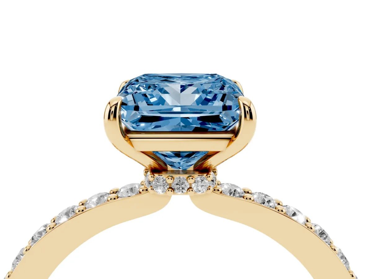 Fancy Blue Princess Cut Diamond Pavé Engagement Ring with Round Accents and Prong Setting Yellow gold