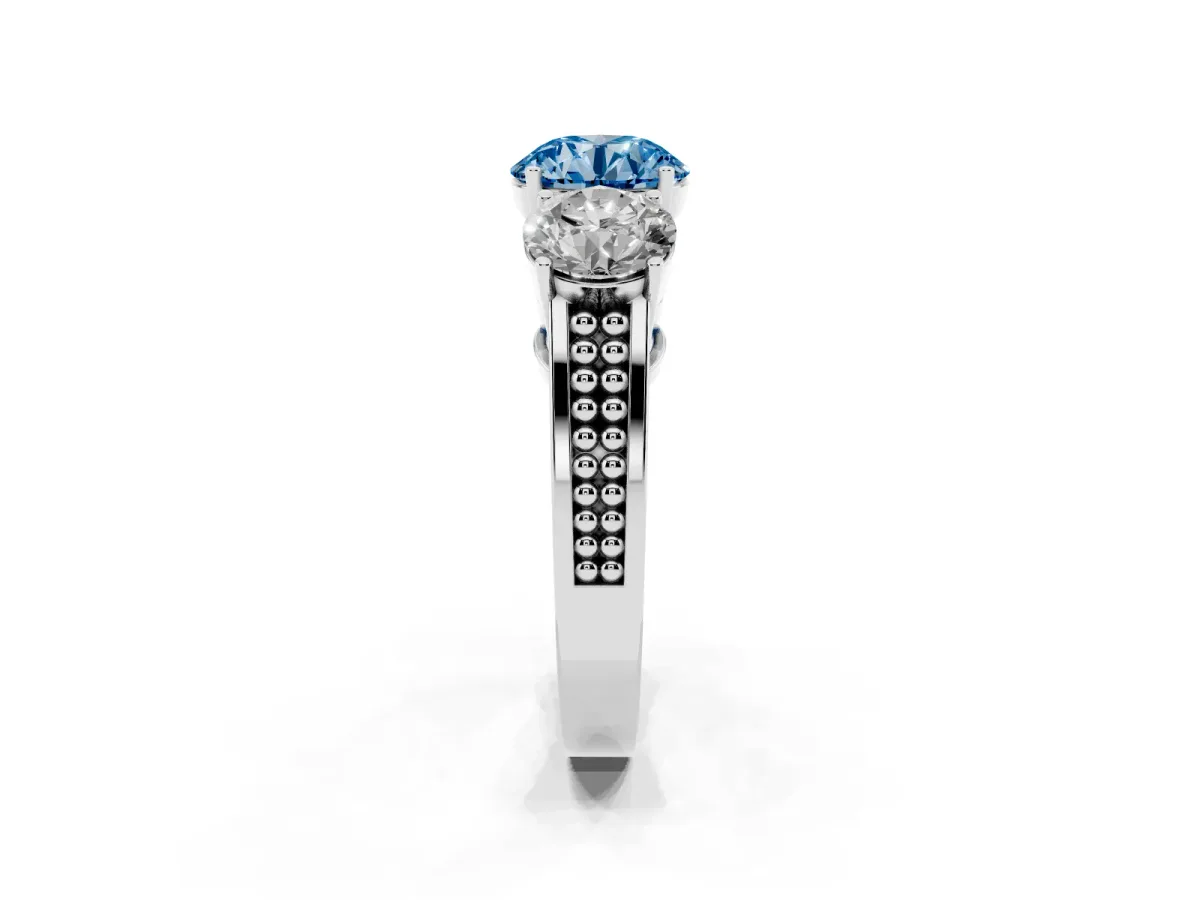 Fancy Blue Round Cut Diamond Three-Stone Ring with Prong Setting and Textured Band Platinum