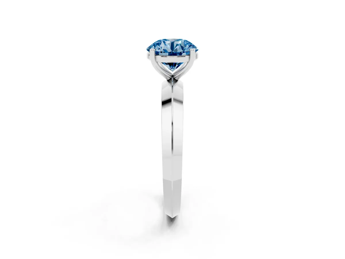 Fancy Blue Round Cut Cut Solitaire Engagement Ring with Flat Band and Four-Prong Setting Silver