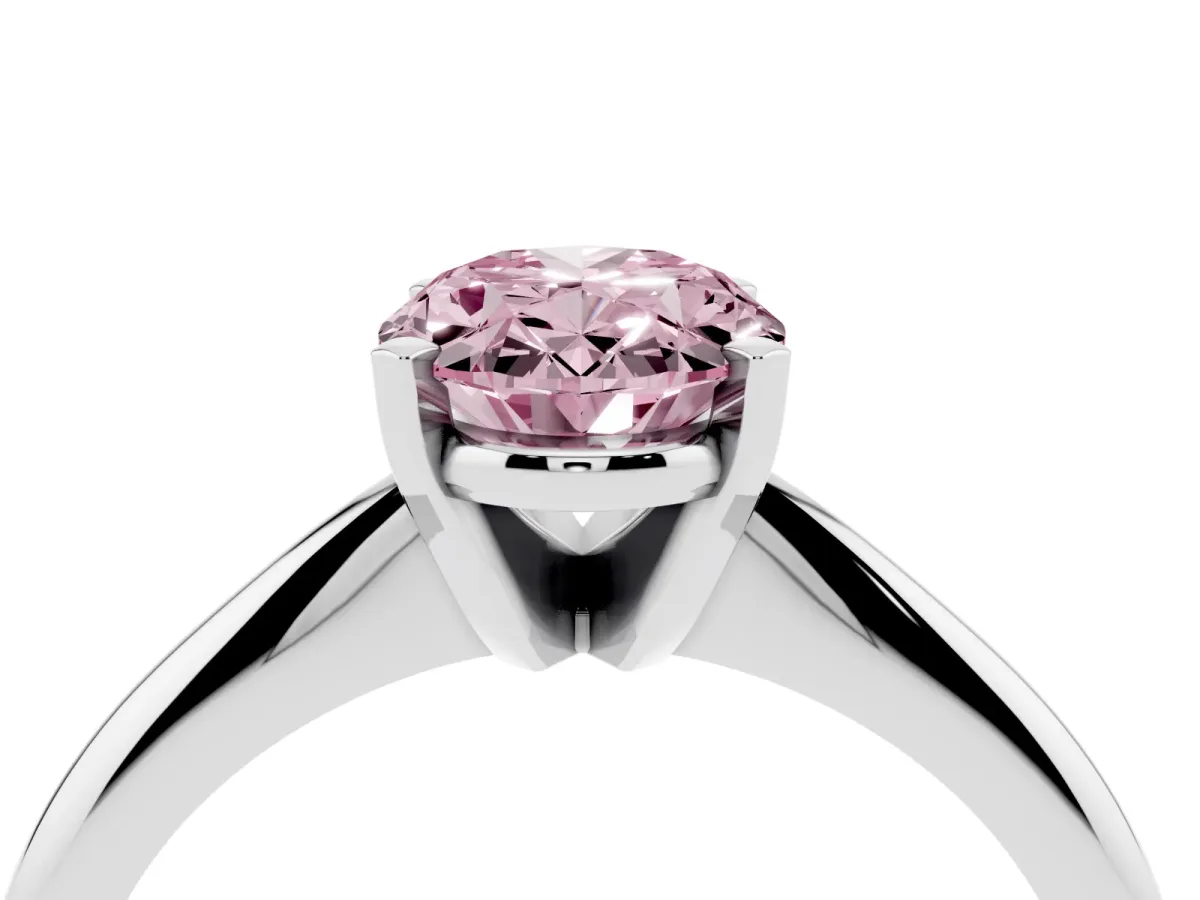 Fancy Pink Oval Cut Cut Solitaire Ring with Four-Prong Setting on a Classic Band Silver