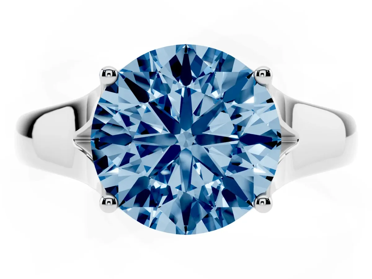 Fancy Blue Round Cut Solitaire Diamond Ring with Cathedral Band and Four-Prong Setting Silver