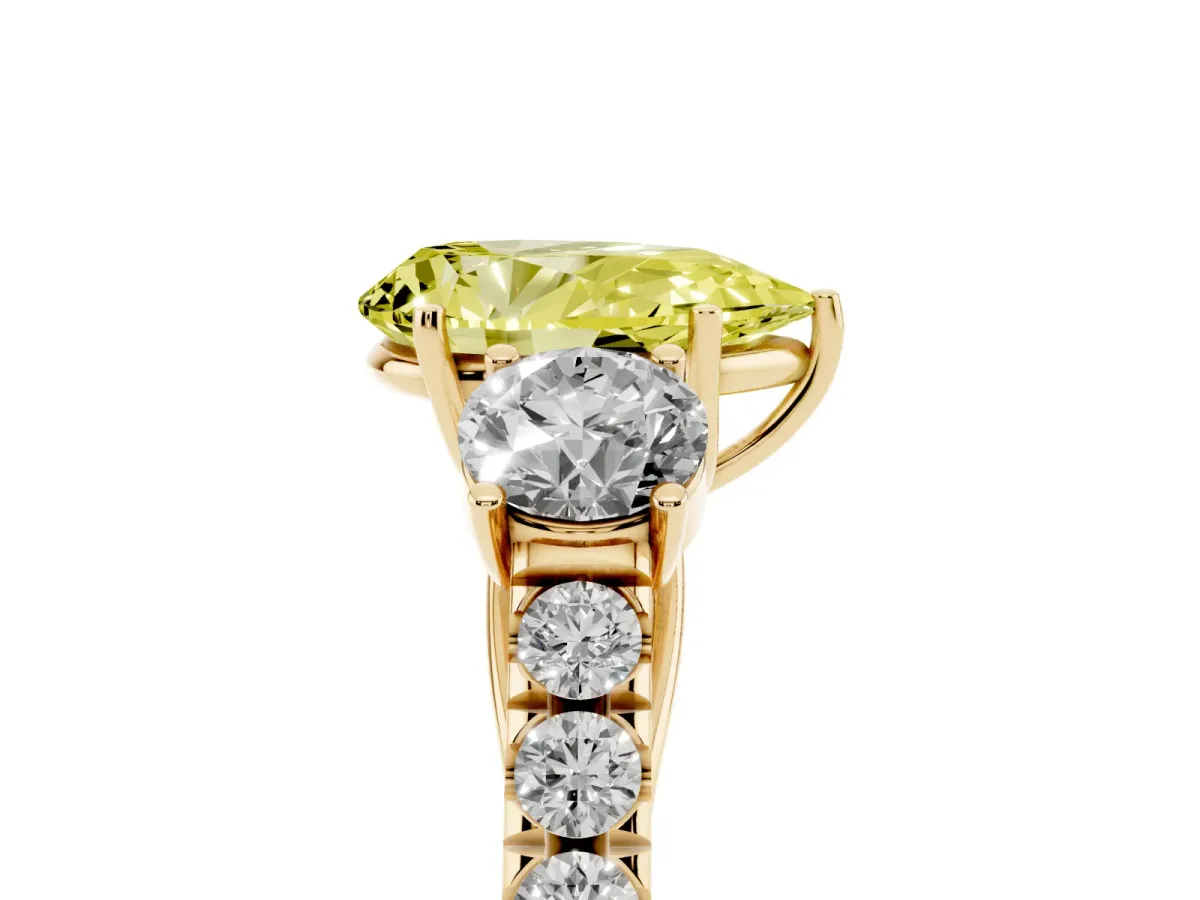 Fancy Yellow Pear Cut Cut Diamond Three-Stone Ring with Round Side Stones and Pavé Band Yellow gold