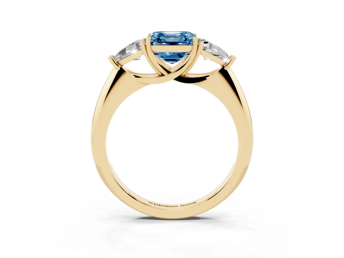 Fancy Blue Three-Stone Asscher Cut Diamond Engagement Ring with Trillion Side Stones and Prong Setting Yellow gold