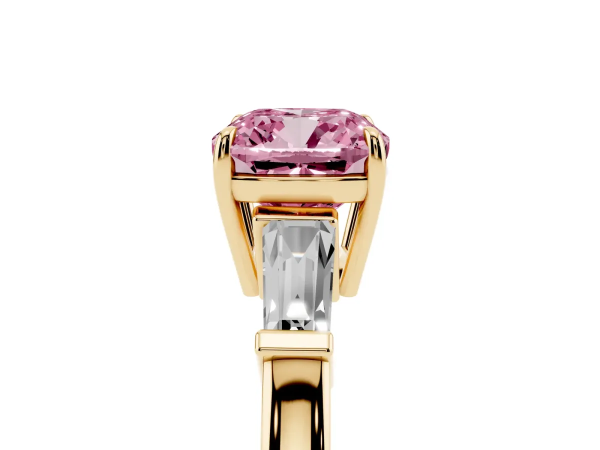 Fancy Pink Cushion Cut Diamond Three-Stone Ring with Tapered Baguette Side Stones and Prong Setting Yellow gold