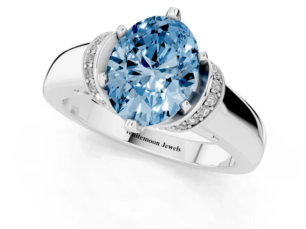 Fancy Blue Oval Cut Solitaire Diamond Ring with Pave Band and Six-Prong Setting Silver