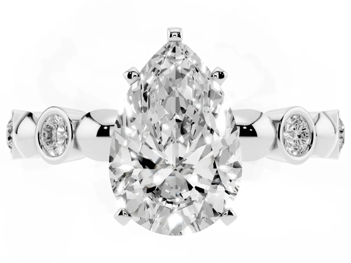 Pear Cut Solitaire Bezel-Set Diamond Ring with Beaded Band and Four-Prong Setting Silver