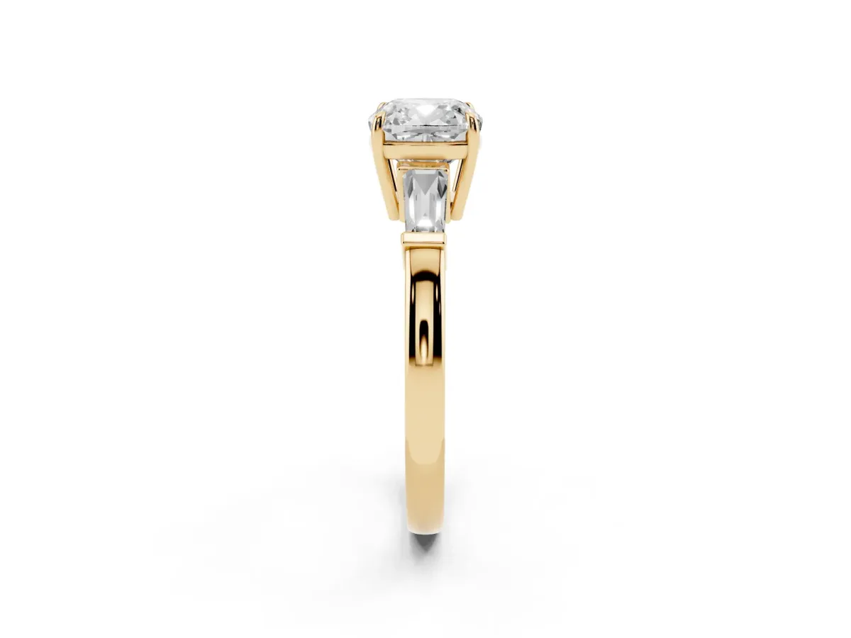 Cushion Cut Diamond Three-Stone Ring with Tapered Baguette Side Stones and Prong Setting Yellow gold