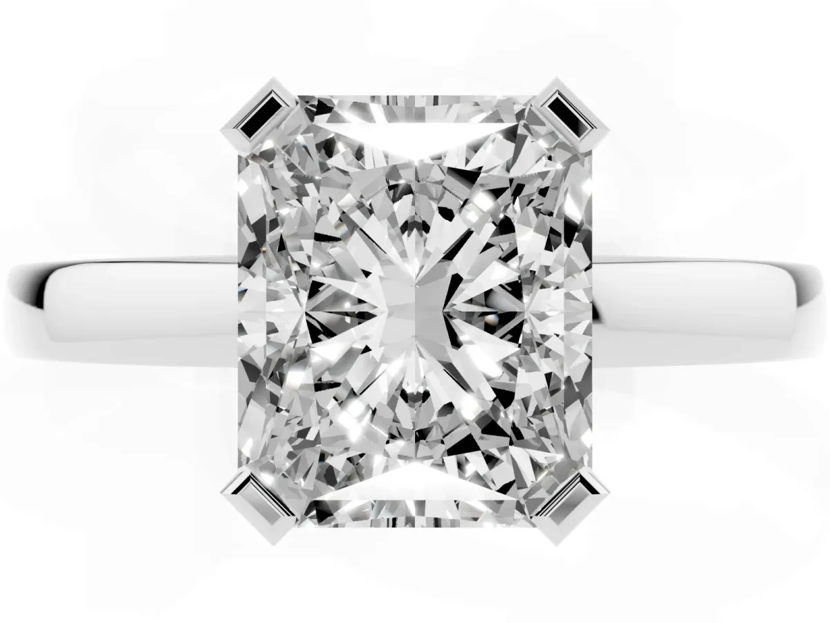 Radiant Cut Cut Solitaire Ring with Four-Prong Setting and Classic Band Silver