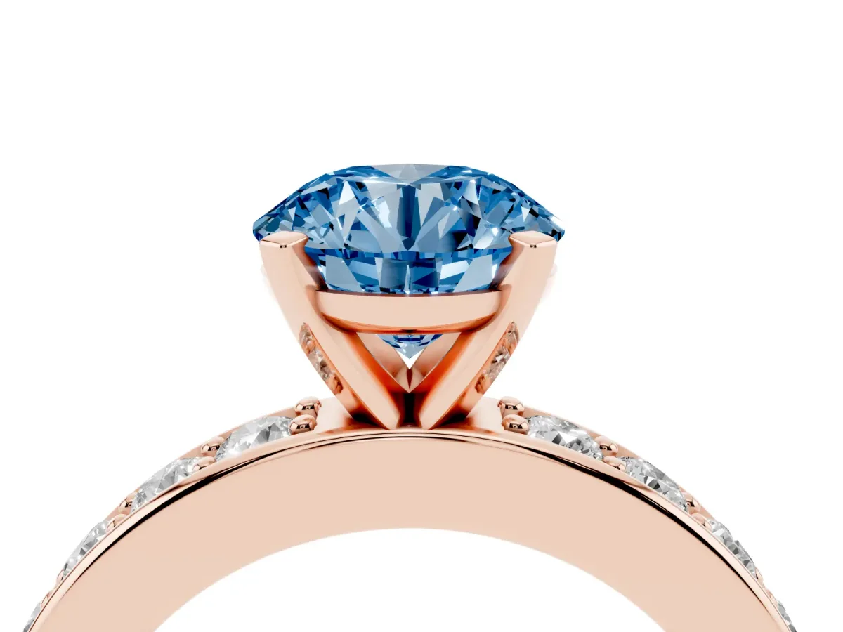 Fancy Blue Round Cut Diamond Engagement Ring with Channel Set Round Band and Prong Setting Rose gold