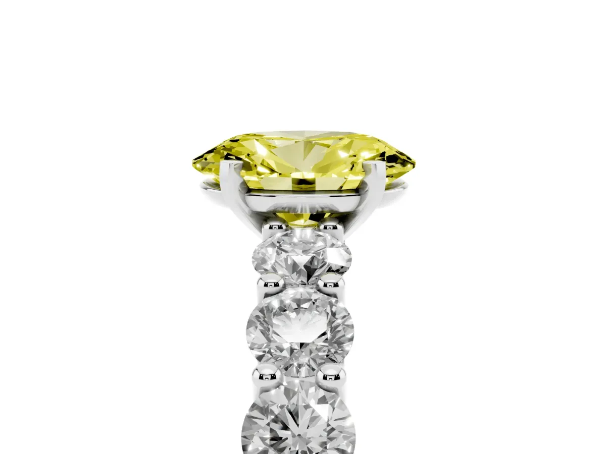 Fancy Yellow Oval Cut Diamond Prong Setting with Side Stones on a Pave Band Silver