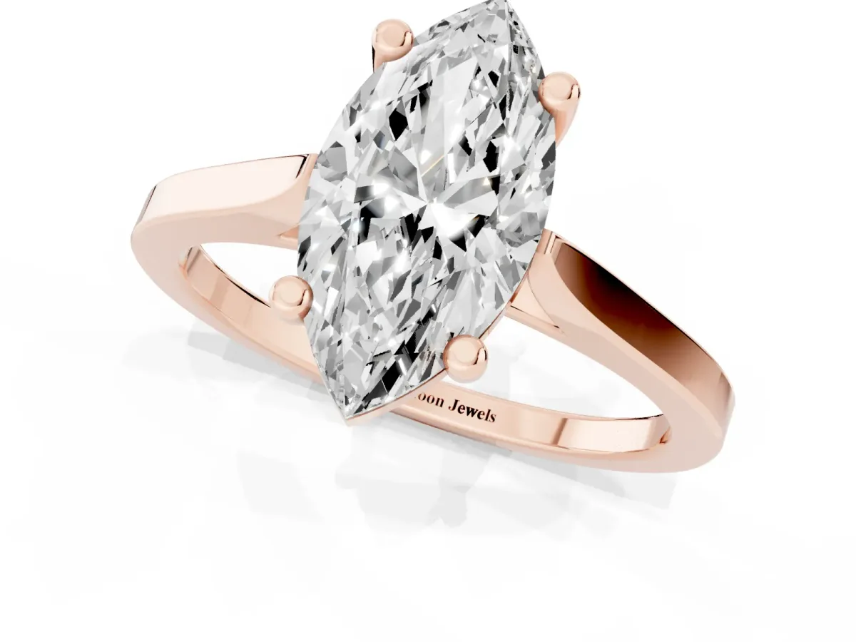 Marquise Cut Solitaire Diamond Ring with Four-Prong Setting and Tapered Band Rose gold