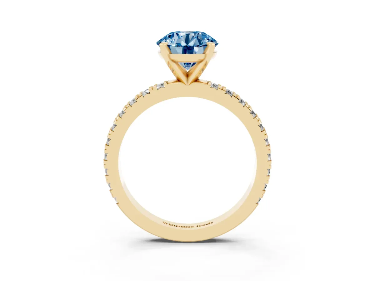 Fancy Blue Round Cut Diamond Pavé Band Solitaire with Four-Prong Setting Yellow gold
