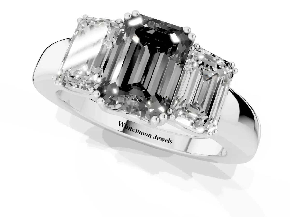 Fancy Black Three-Stone Emerald Cut Cut Diamond Ring with Channel Set Band and Four-Prong Setting Silver