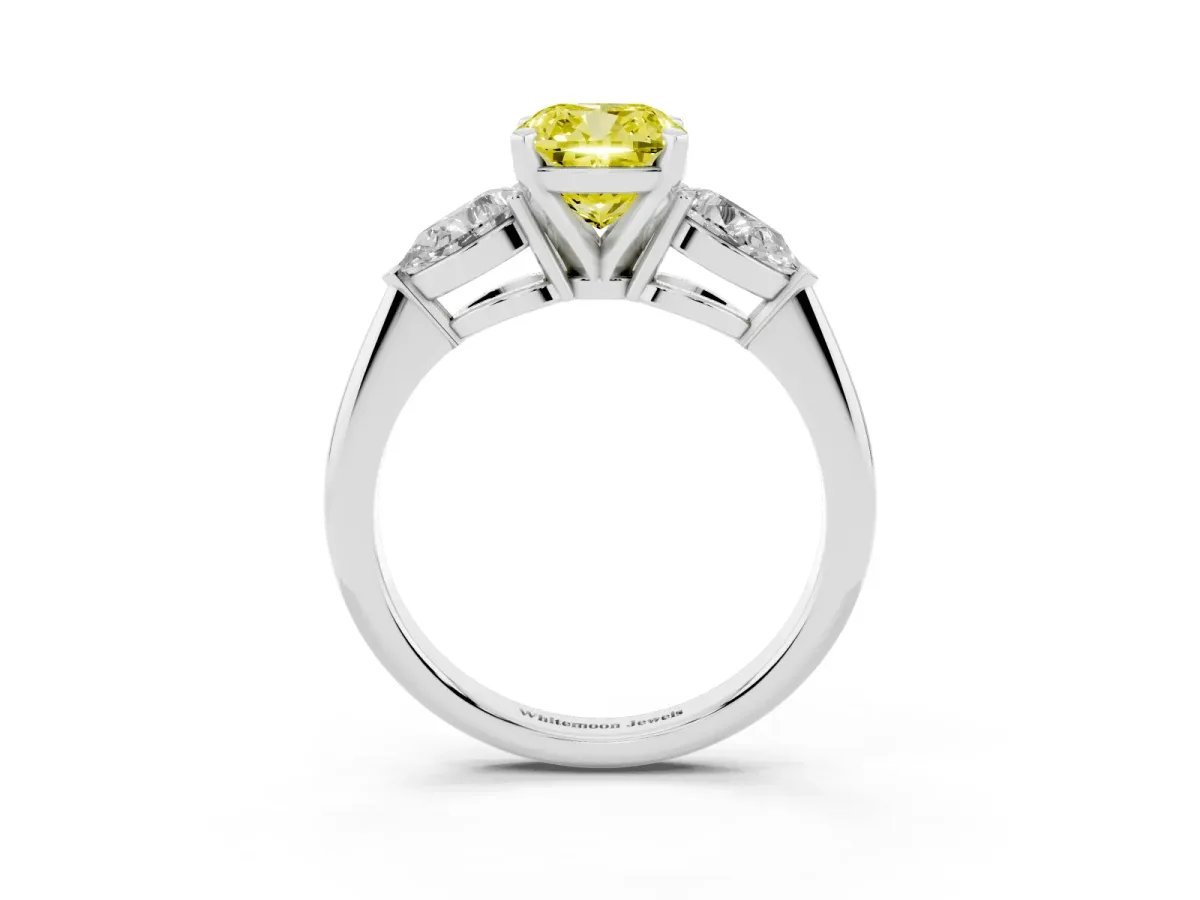 Fancy Yellow Three-Stone Cushion Cut Diamond Ring with Pear Side Stones and Four-Prong Setting Silver