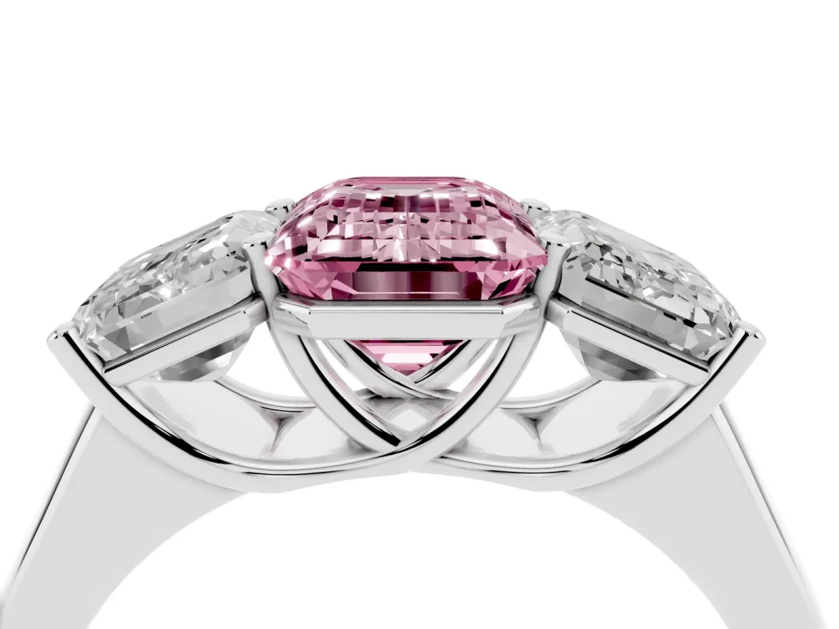 Fancy Pink Emerald Cut Three-Stone Diamond Ring with Prong Setting on a Classic Band Silver