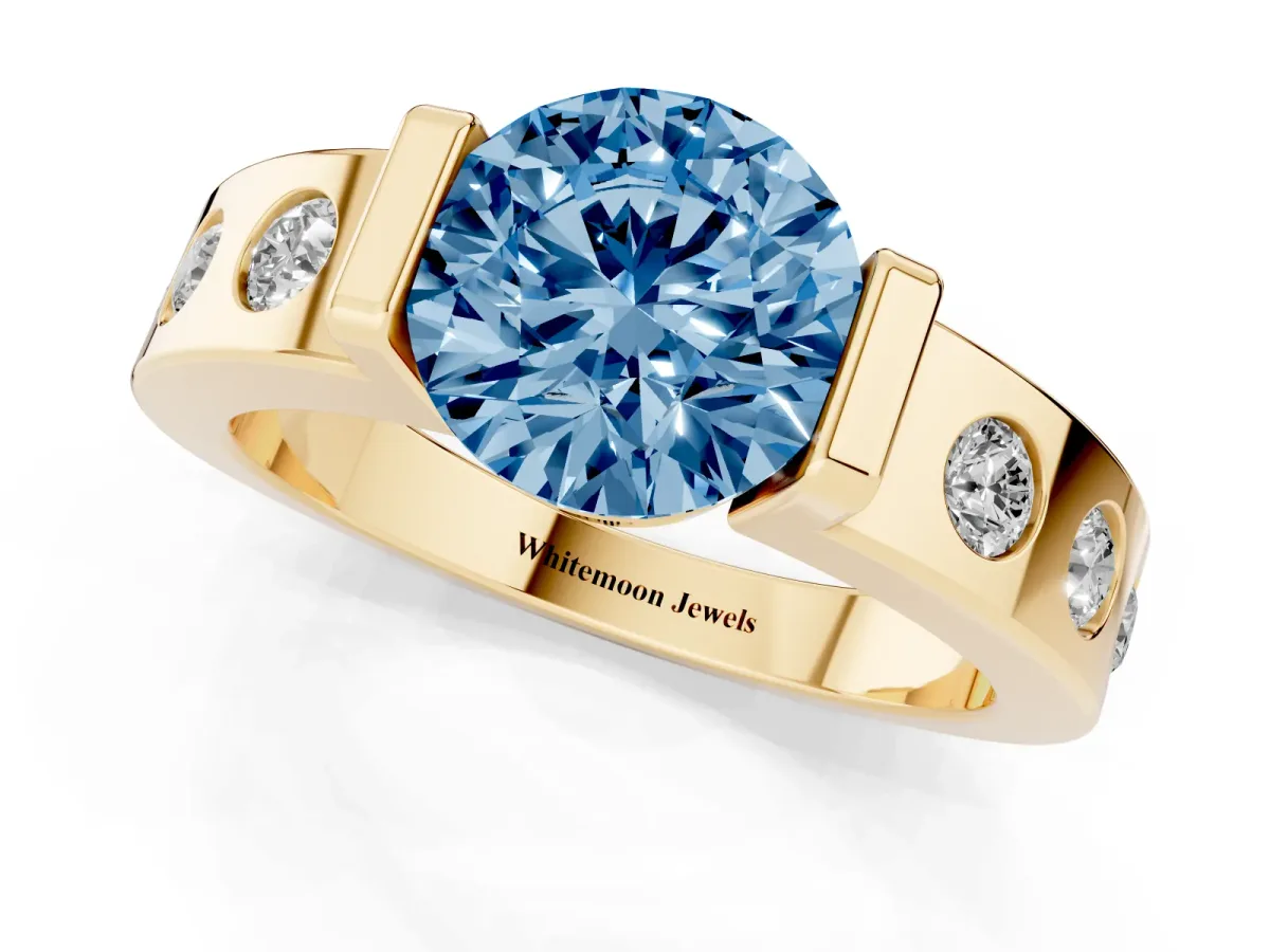 Fancy Blue Round Cut Brilliant Channel-Set Diamond Ring with Bezel Prong Setting Yellow gold