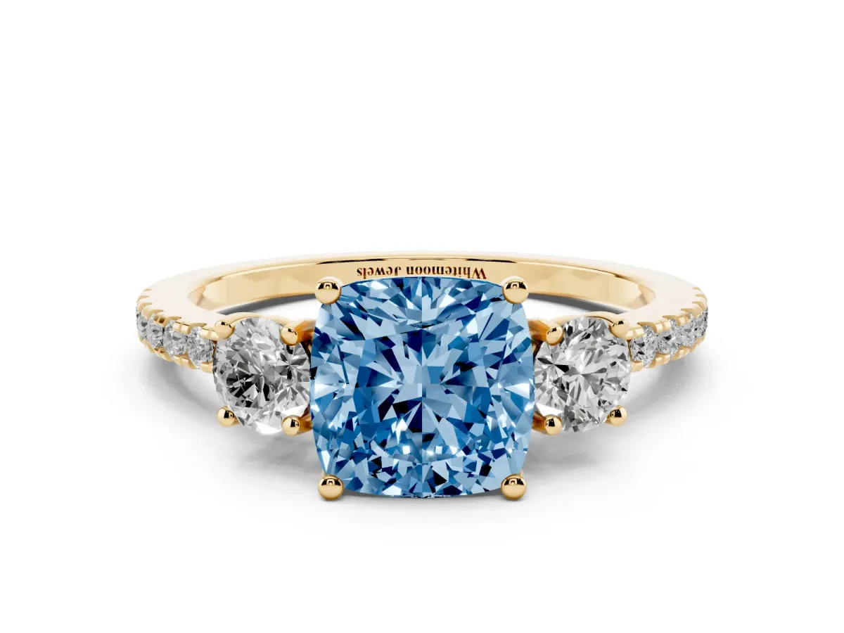 Fancy Blue Three-Stone Cushion Cut Cut Diamond Pavé Band with Prong Setting Yellow gold