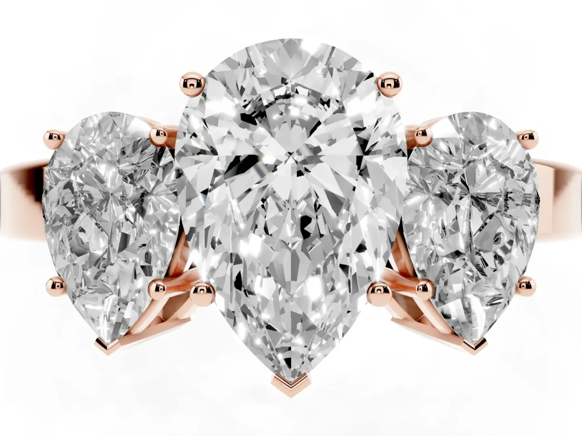 Three-Stone Pear Cut Cut Diamond Engagement Ring with Flat Band and Four-Prong Setting Rose gold