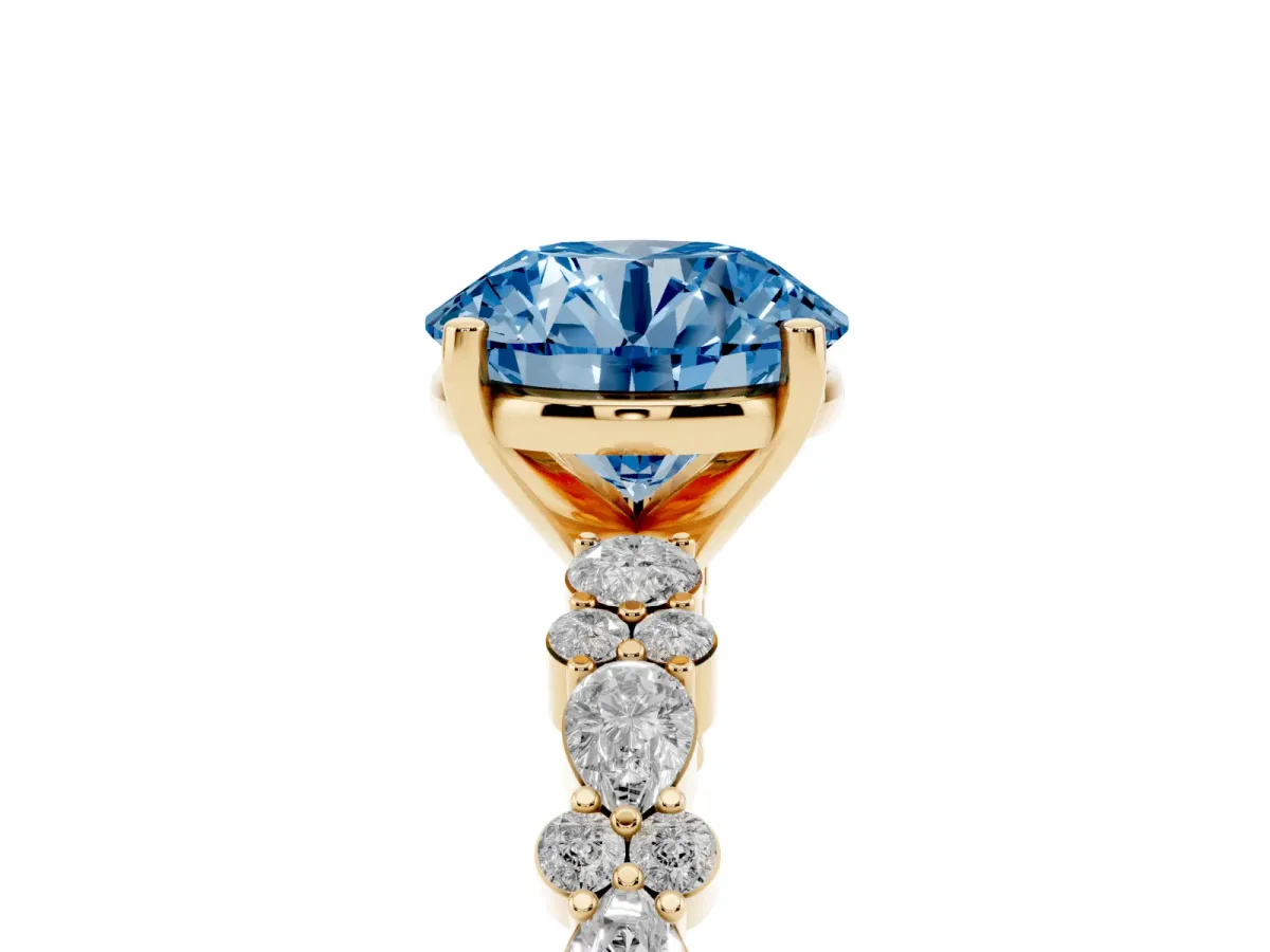 Fancy Blue Round Cut Diamond Side Stone Solitaire Ring with Round and Four-Prong Setting Yellow gold