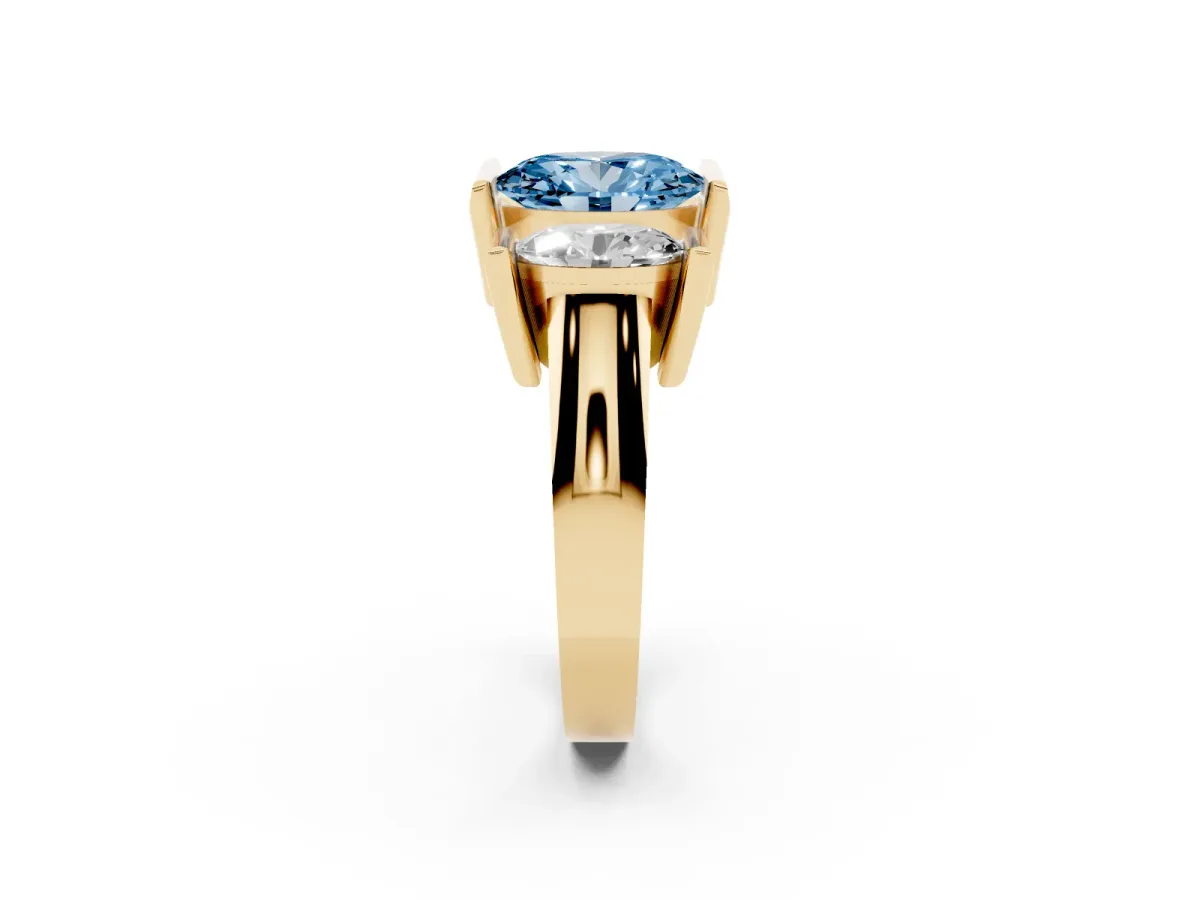 Fancy Blue Three Stone Oval Cut Cut Channel Set Diamond Ring Yellow gold