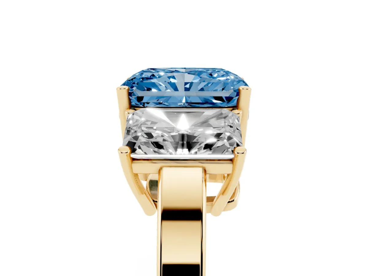 Fancy Blue Three-Stone Radiant Cut Cut Diamond Engagement Ring with Flat Band and Four-Prong Setting Yellow gold