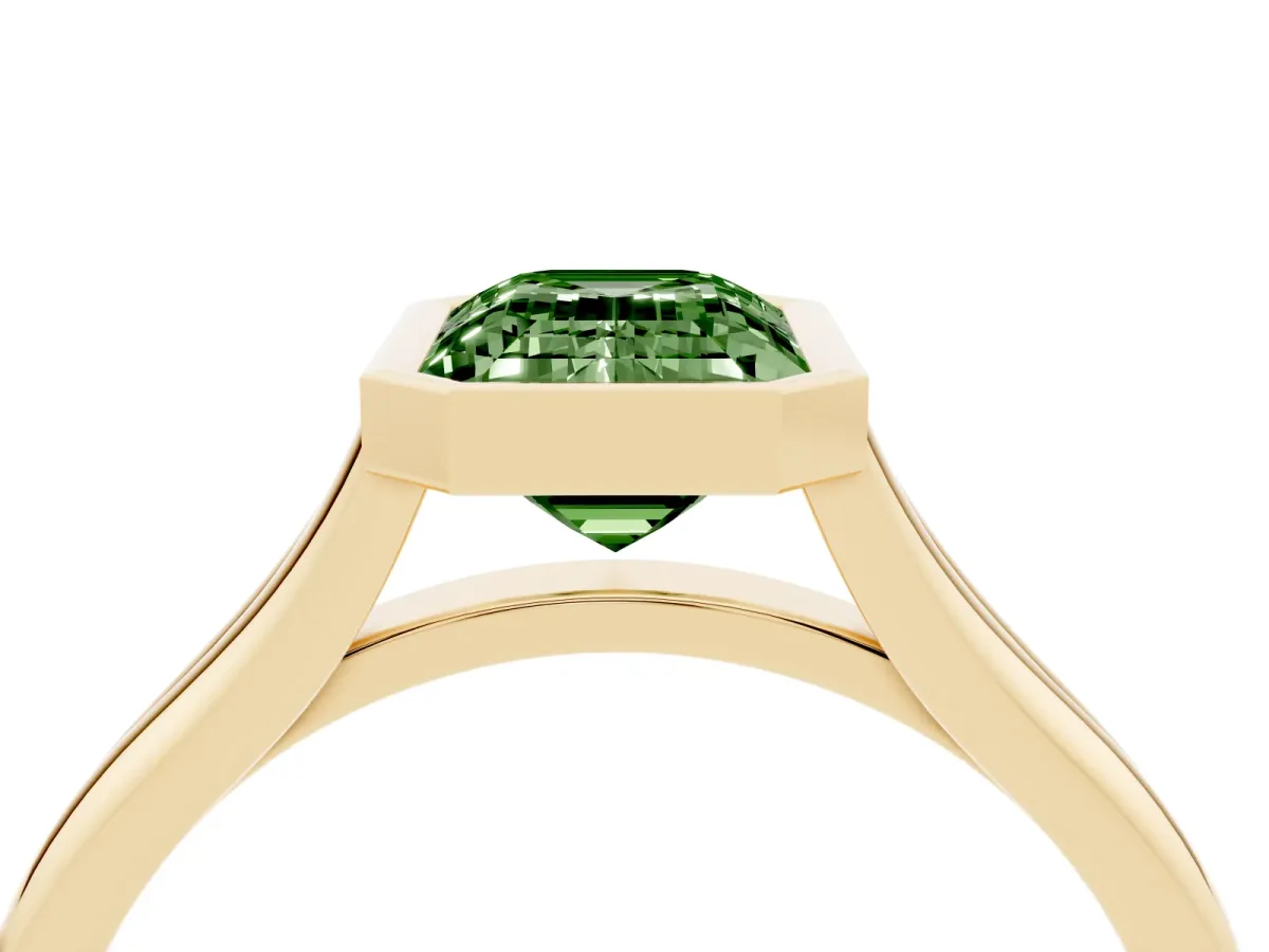 Fancy Green Bezel Set Emerald Cut Cut Solitaire Ring with Tapered Band Yellow gold