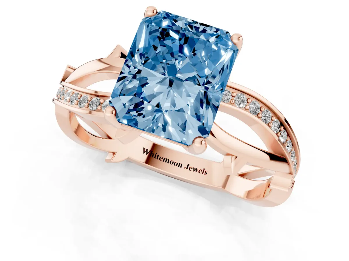 Fancy Blue Radiant Cut Solitaire Twist Band with Pavé Accents and Four-Prong Setting Rose gold