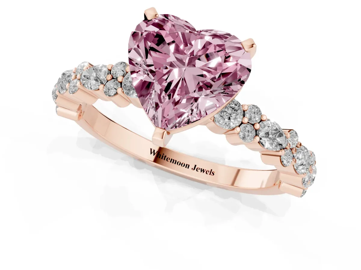 Fancy Pink Heart Cut Diamond Side Stone Solitaire Ring with Round and Four-Prong Setting Rose gold