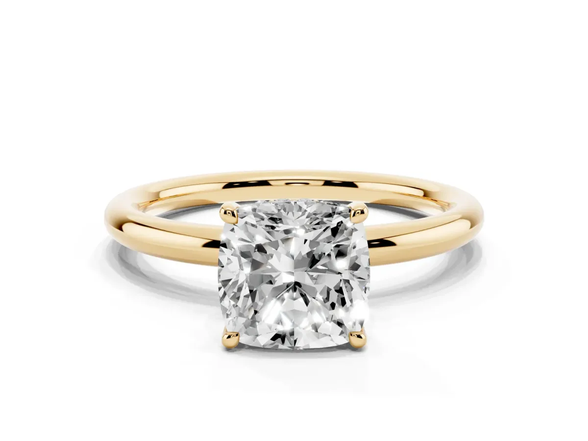 Cushion Cut Diamond Solitaire Ring with Thin Band and Four-Prong Setting Yellow gold