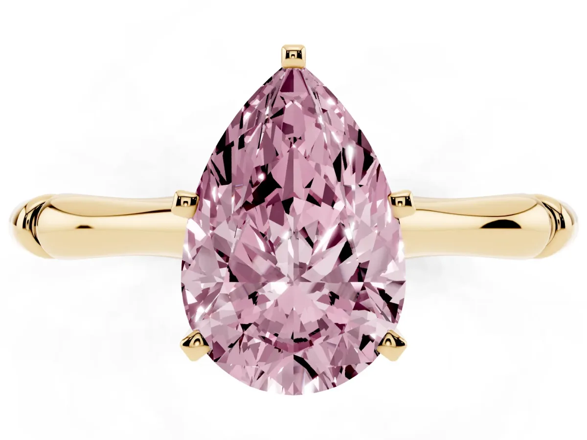 Fancy Pink Pear Cut Solitaire Diamond Ring with Bamboo Band and Four-Prong Setting Yellow gold
