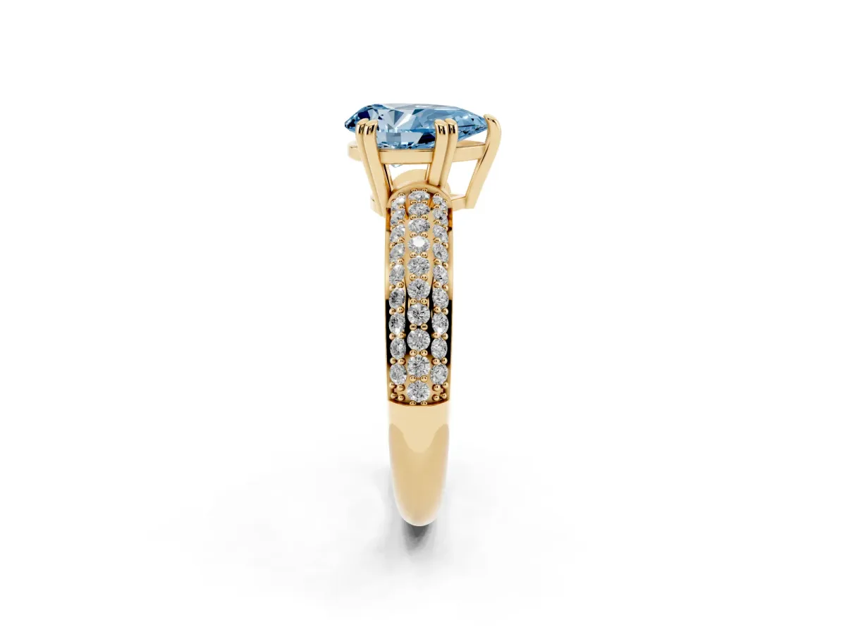 Fancy Blue Pear Cut Diamond Solitaire Ring with Multi-Row Round Pavé Band and Prong Setting Yellow gold