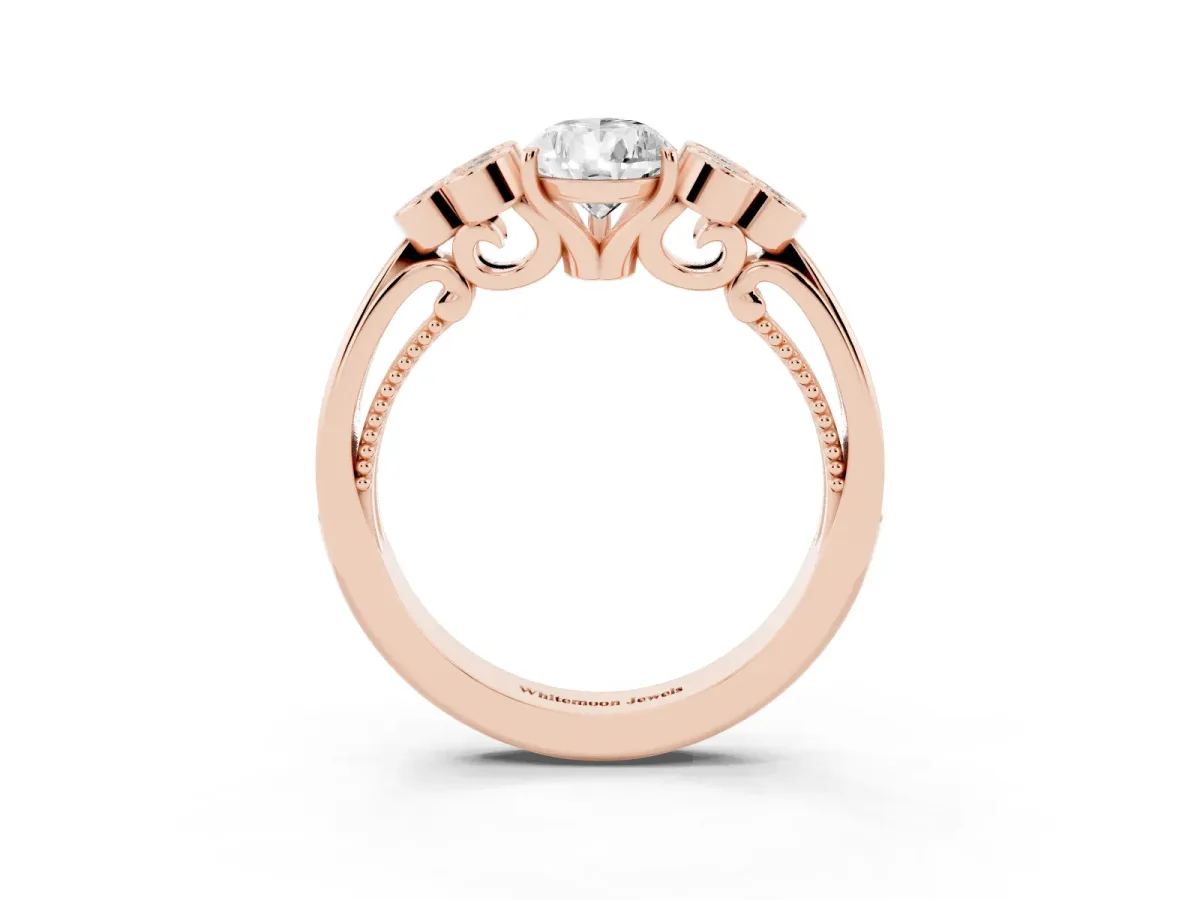 Pear Cut Cut Diamond Engagement Ring with Bezel Set Round Side Stones and Prong Setting Rose gold