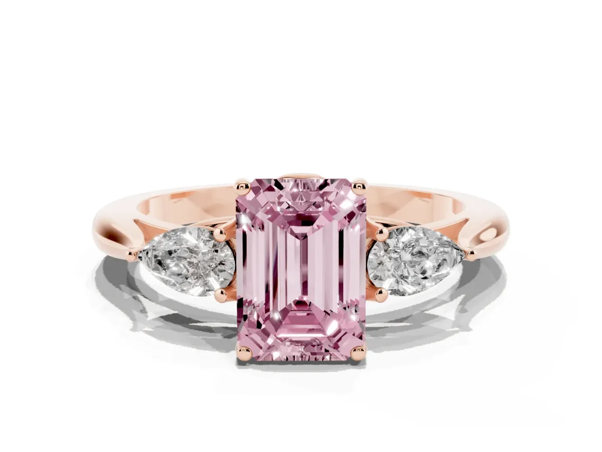 Fancy Pink Three-Stone Emerald Cut Brilliant Diamond Solitaire Ring with Tapered Band and Four-Prong Setting Rose gold