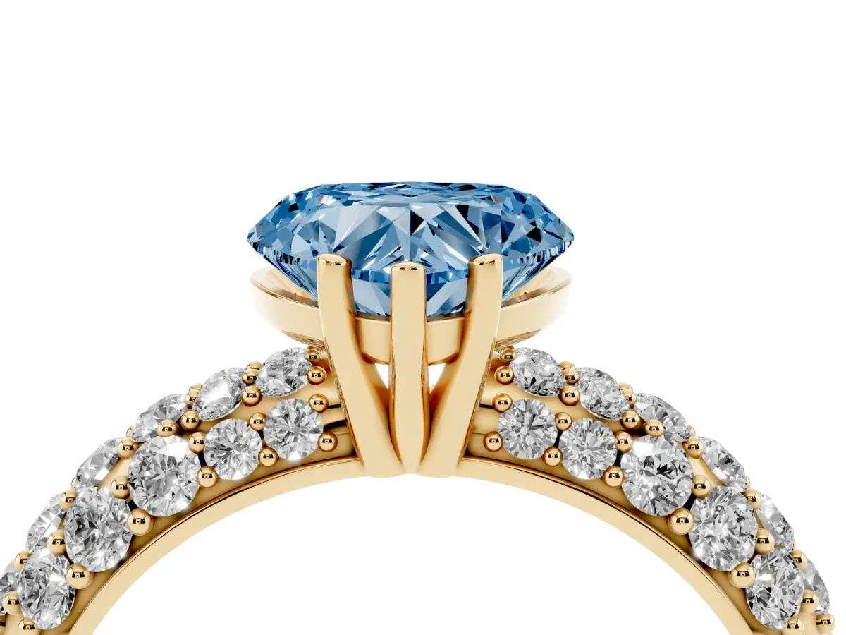 Fancy Blue Heart Cut Diamond Pavé Band Solitaire Ring with Four-Prong Setting Yellow gold