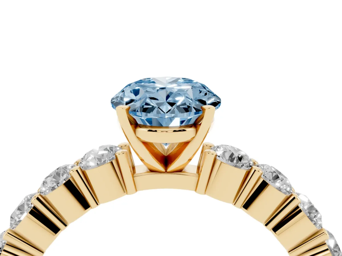 Fancy Blue Oval Cut Diamond Solitaire Ring with Shared Prong Round Side Stones Yellow gold