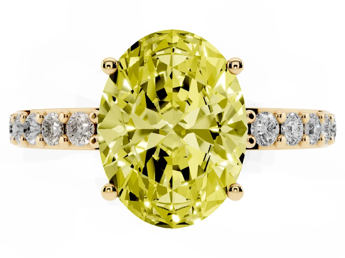 Fancy Yellow Oval Cut Cut Diamond Solitaire with Pave Band and Four-Prong Setting Yellow gold