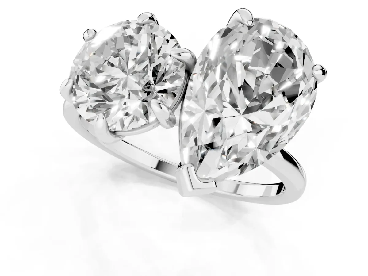 Round and Pear Toi Moi Ring with Prong Setting and Plain Band Platinum
