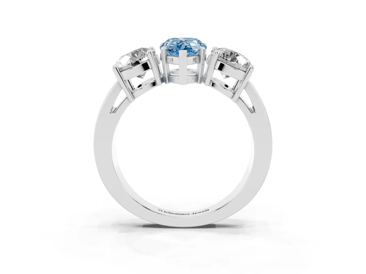 Fancy Blue Three-Stone Pear Cut Diamond Ring with Round Side Stones, Classic Band, and Four-Prong Setting White gold