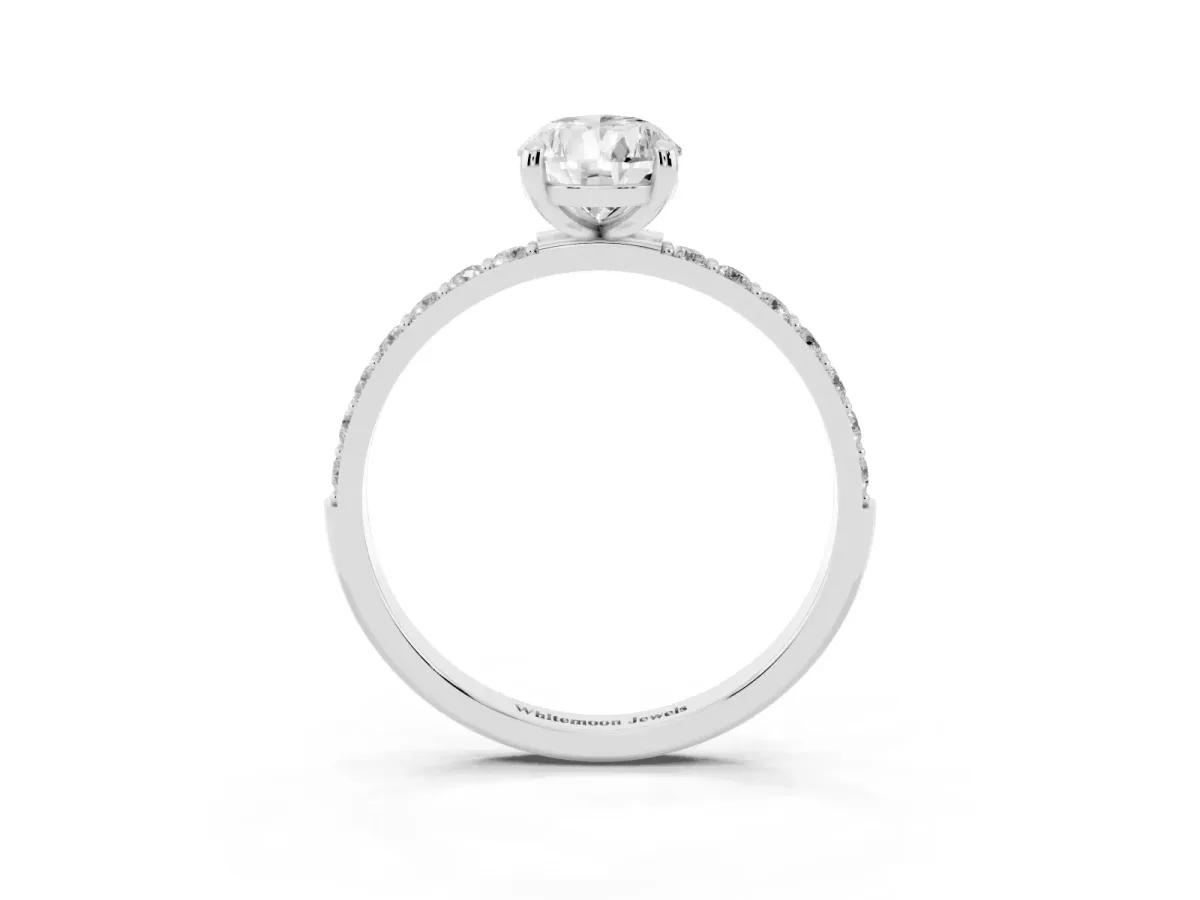 Pear Cut Diamond Solitaire Ring with Round Pavé Band and Prong Setting Silver