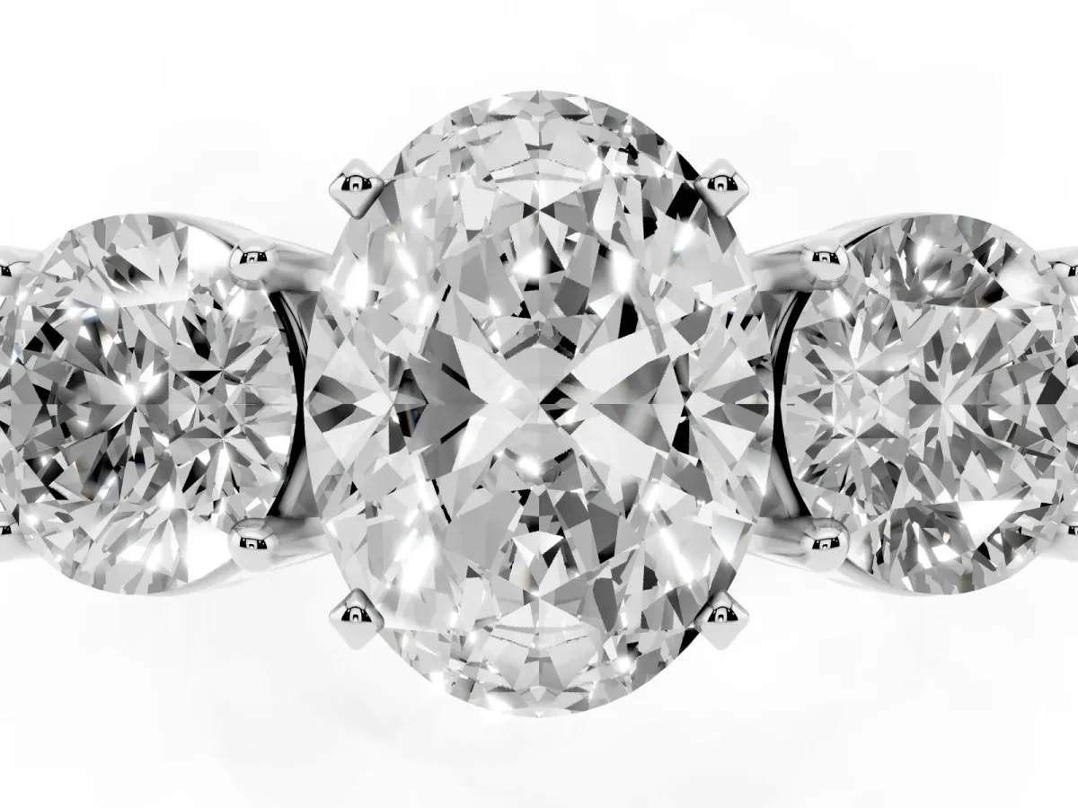 Three-Stone Oval Cut Diamond Ring with Round Side Stones, Classic Band, and Four-Prong Setting Silver
