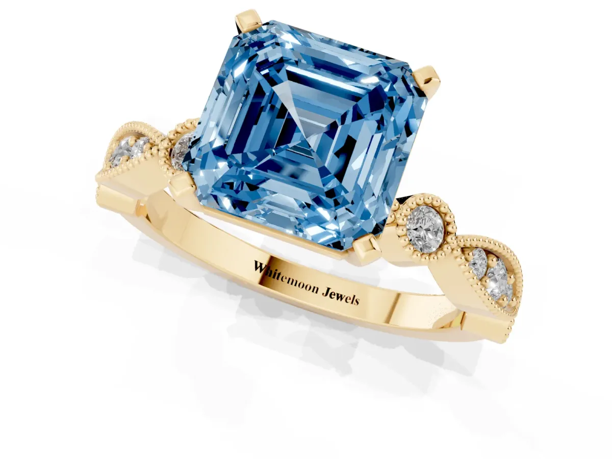 Fancy Blue Asscher Cut Milgrain Bezel Diamond Engagement Ring with Solitaire Prong Setting Yellow gold