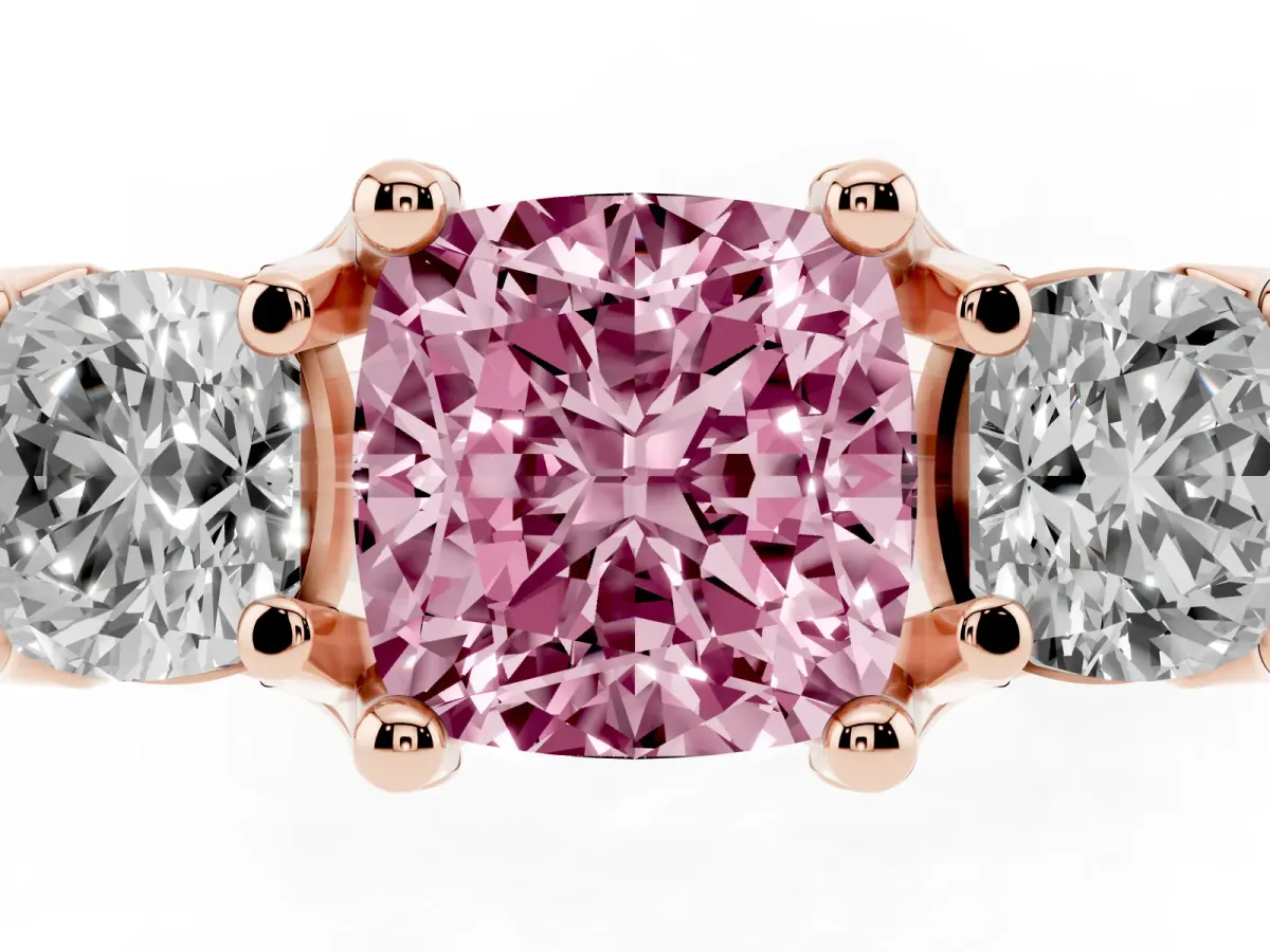 Fancy Pink Cushion Cut Diamond Three-Stone Ring with Channel Set Band and Four-Prong Setting Rose gold