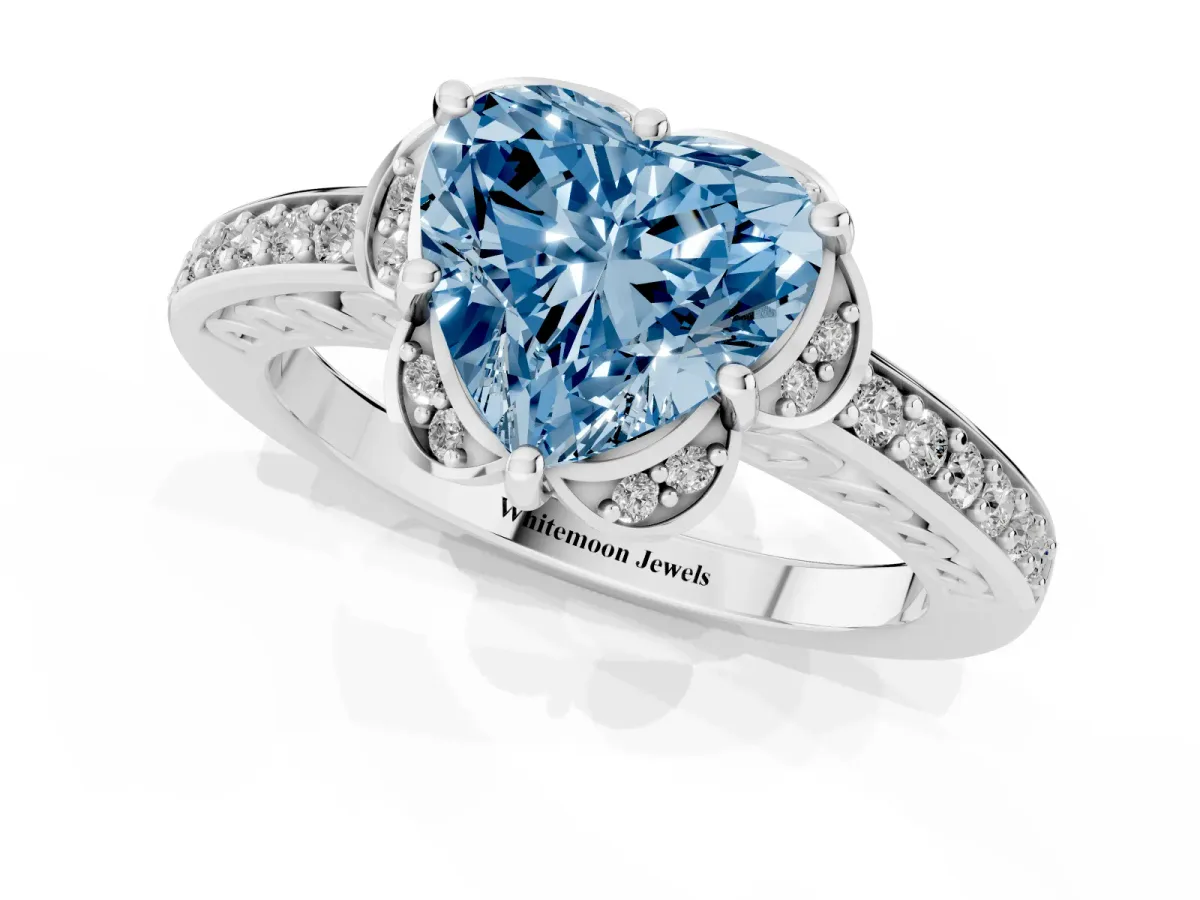 Fancy Blue Heart Cut Cut Halo Diamond Ring with Channel Set Band and Four-Prong Setting Platinum