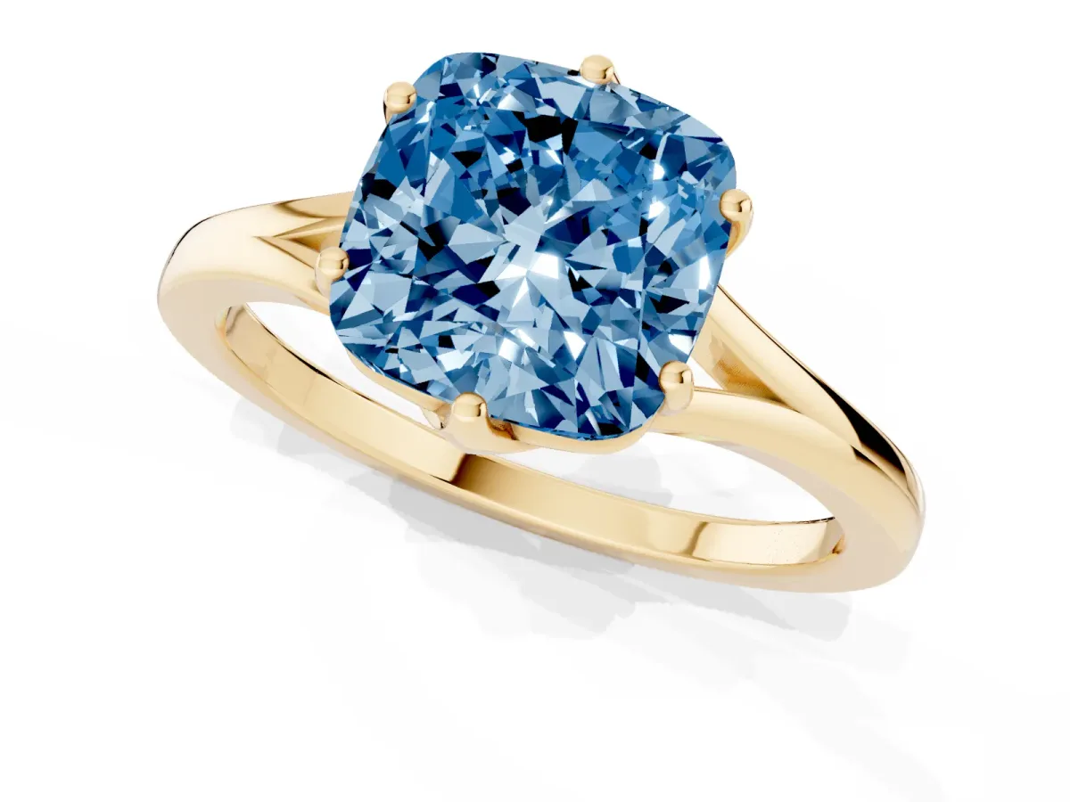 Fancy Blue Cushion Cut Solitaire Diamond Ring with Six-Prong Setting and Tapered Band Yellow gold