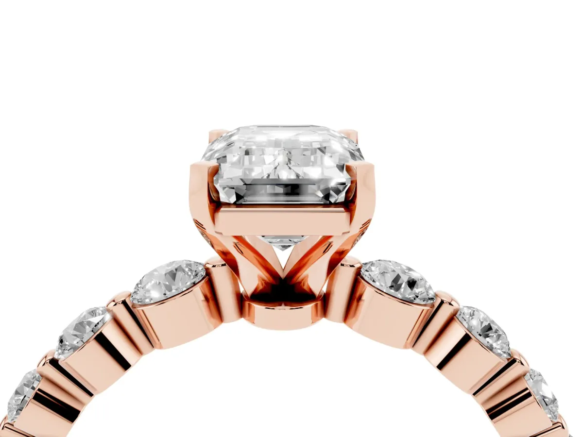 Emerald Cut Solitaire Diamond Ring with Pave Band and Four-Prong Setting Rose gold