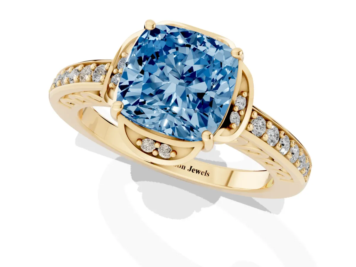 Fancy Blue Cushion Cut Cut Halo Diamond Ring with Channel Set Band and Four-Prong Setting Yellow gold