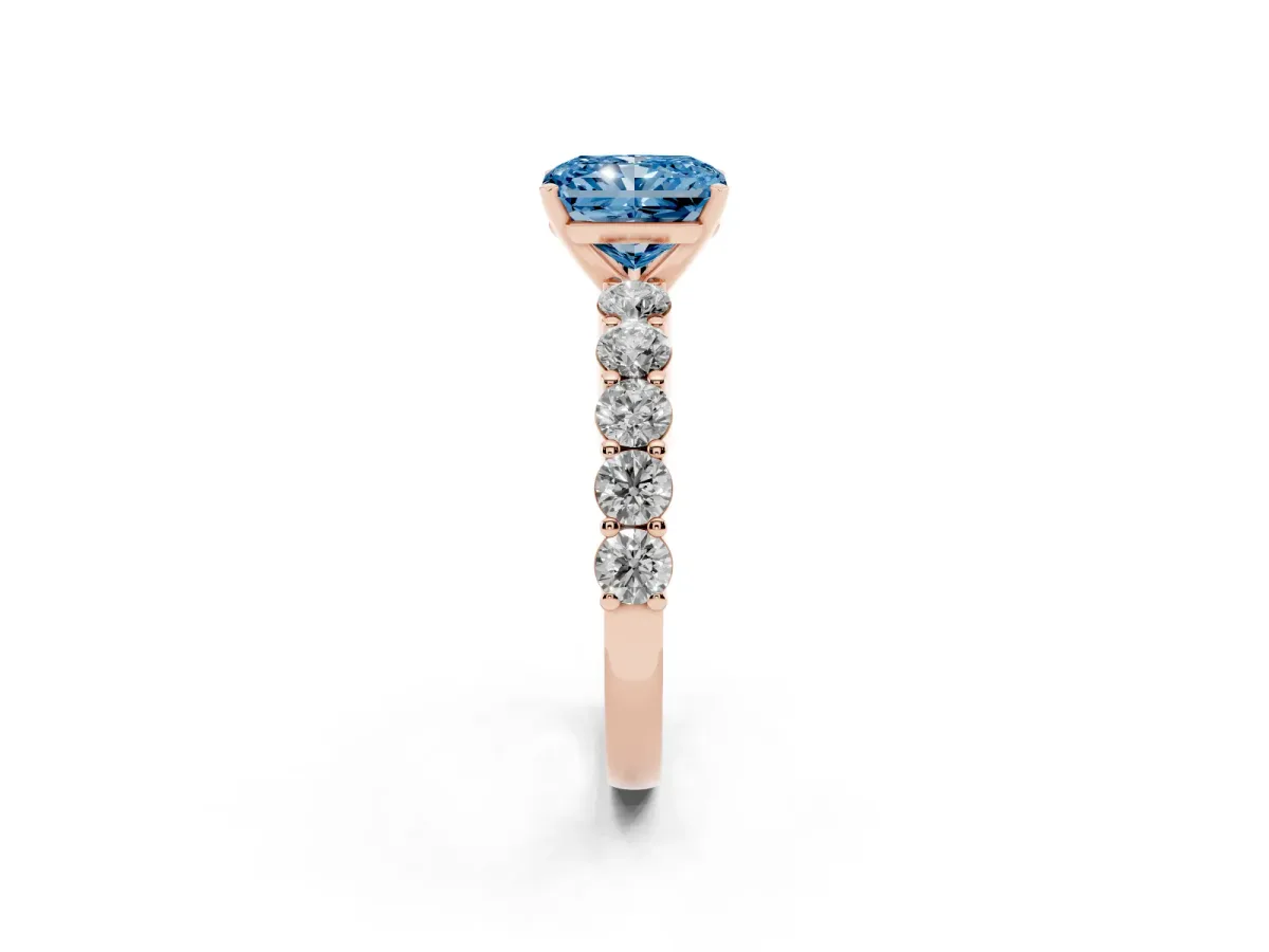Fancy Blue Radiant Cut Diamond Solitaire Ring with Shared Prong Round Side Stones Rose gold