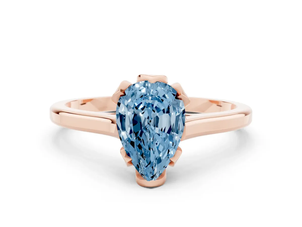 Fancy Blue Pear Cut Diamond Solitaire Ring with Flower Prong Setting and Classic Band Rose gold