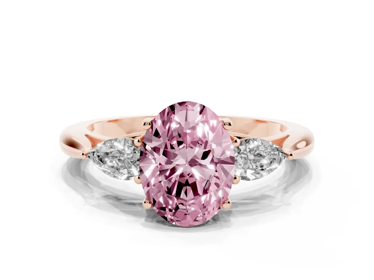 Fancy Pink Three-Stone Oval Cut Brilliant Diamond Solitaire Ring with Tapered Band and Four-Prong Setting Rose gold