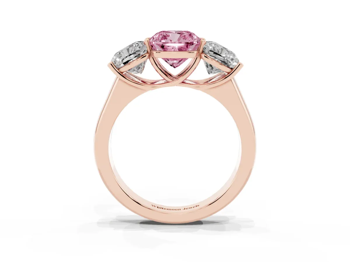 Fancy Pink Cushion Cut Three-Stone Diamond Ring with Prong Setting on a Classic Band Rose gold